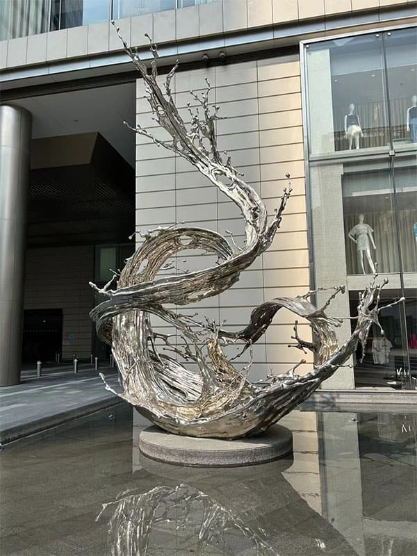 Stainless steel wave sculpture